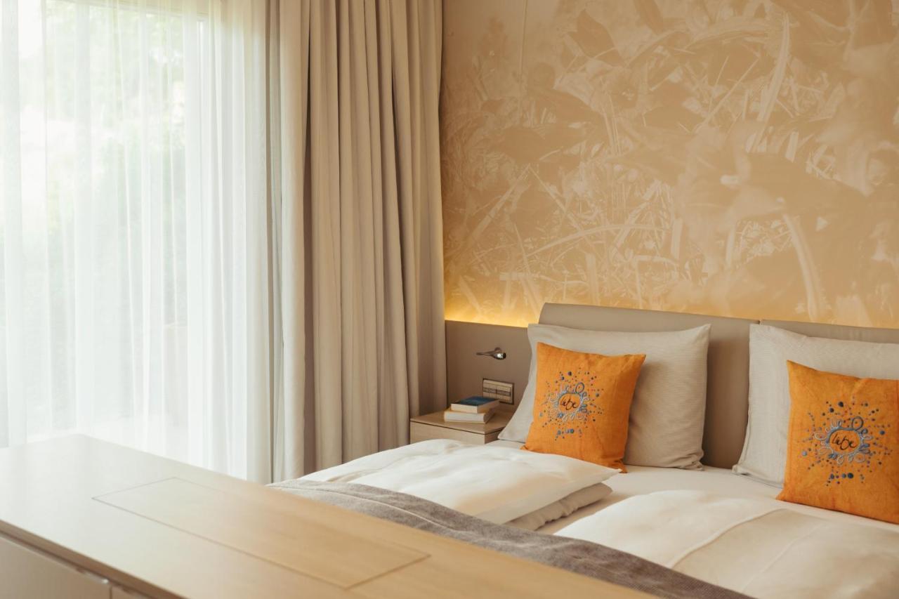 Strandhotel Am Weissensee Exterior photo